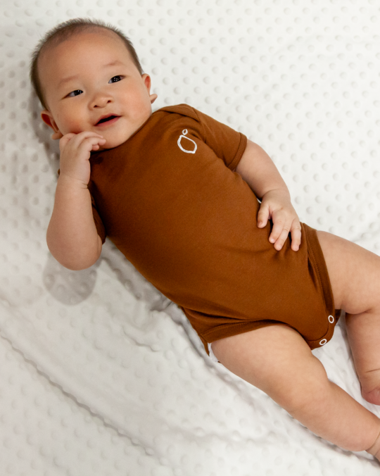 LIMAU short sleeve bodysuit is available in 0 to 3 months, 3 to 6 months and 6 to 12 months.