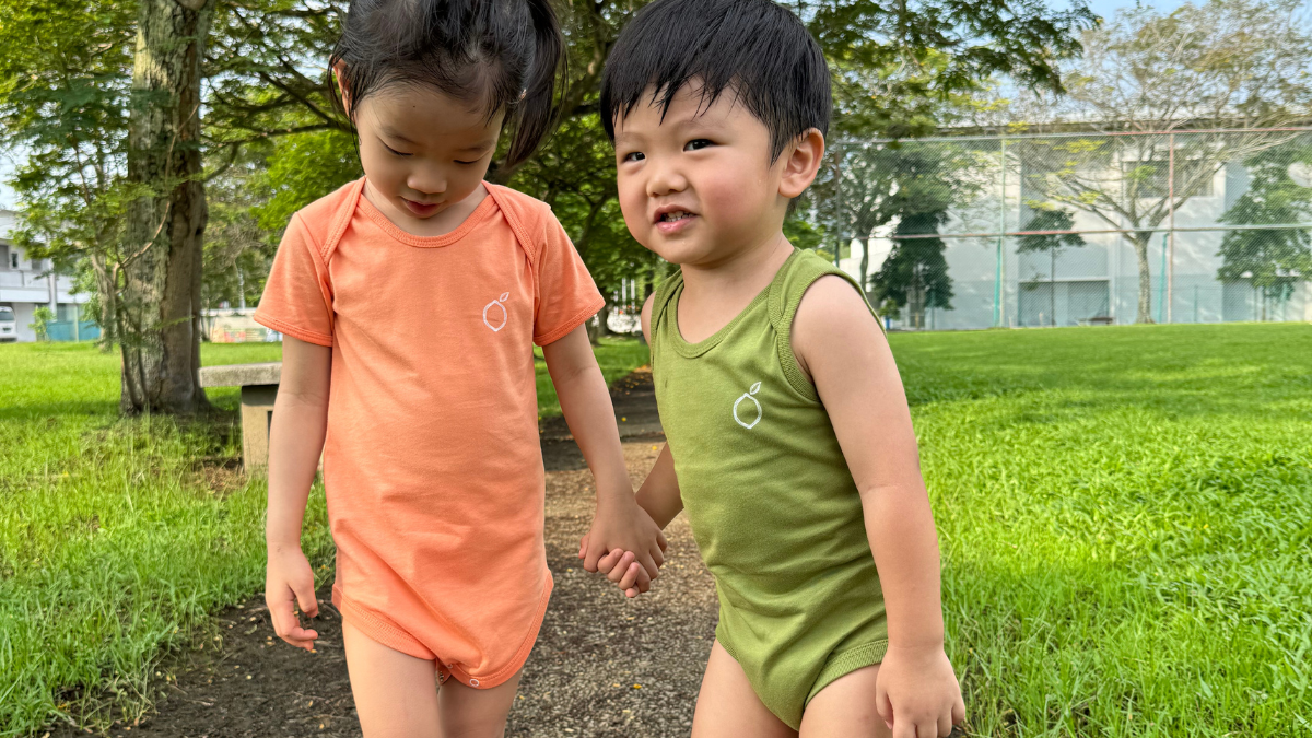 Build a timeless baby wardrobe with nature-inspired colors. Discover how unisex clothing supports child development & creates beautiful memories.